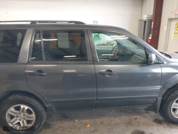 2005 Honda Pilot EX-L with RES with VIN 2HKYF18655H521175, listed as a IAAI auction lot 41490812 with 357,033 mi miles. Bid and sale history available at carsss.com. Image 14.