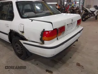 1993 Honda Accord z VIN 1HGCB7651PA022436, wystawiony jako IAAI lot #41785092 z przebiegiem Nie podano mil oraz . Historia ofert i sprzedaży dostępna na DreamBid. Obrazek 6.