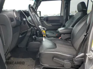2016 Jeep Wrangler Unlimited Sport z VIN 1C4BJWDG5GL179046, wystawiony jako Copart lot #52989725 z przebiegiem 129 051 mil mil oraz Szkoda całkowita • Salvage title. Historia ofert i sprzedaży dostępna na DreamBid. Obrazek 7.