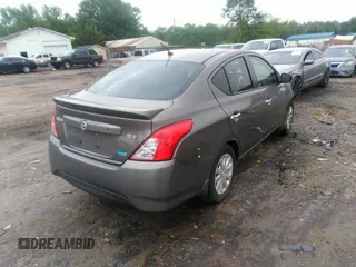 2015 Nissan Versa SV with VIN 3N1CN7AP7FL869485, listed as a IAAI auction lot 42077524 with 198,646 mi miles. Bid and sale history available at carsss.com. Image 4.
