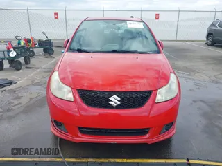 2009 Suzuki SX4 Sport FWD with VIN JS2YC414596200021, listed as a IAAI auction lot 40753192 with 144,805 mi miles and . Bid and sale history available at DreamBid. Image 12.