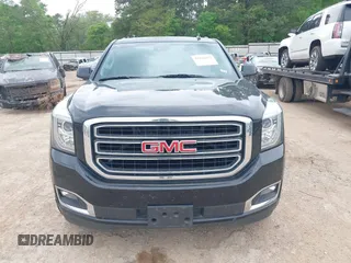 2015 GMC Yukon SLT with VIN 1GKS1BKC5FR274408, listed as a IAAI auction lot 41942157 with 165,978 mi miles. Bid and sale history available at carsss.com. Image 12.