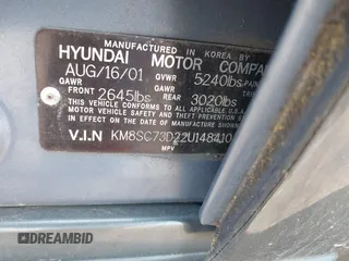 2002 Hyundai Santa Fe GLS with VIN KM8SC73D22U148410, listed as a IAAI auction lot 42159042 with 141,232 mi miles. Bid and sale history available at carsss.com. Image 9.