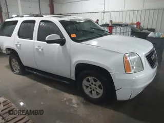 2007 GMC Yukon SLT with VIN 1GKFK130X7R203221, listed as a IAAI auction lot 41583409 with 254,586 mi miles. Bid and sale history available at carsss.com. Image 1.
