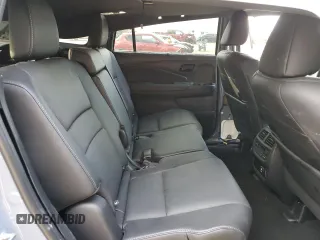 2022 Honda Passport Elite z VIN 5FNYF8H01NB002305, wystawiony jako Copart lot #49740525 z przebiegiem 37 134 mil mil oraz Szkoda całkowita • Salvage title. Historia ofert i sprzedaży dostępna na DreamBid. Obrazek 11.