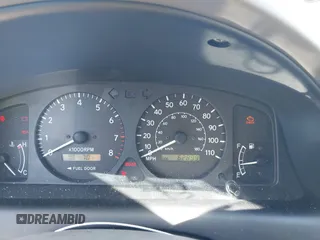 2002 Toyota Corolla CE with VIN 1NXBR12E92Z654340, listed as a IAAI auction lot 41805390 with 62,899 mi miles and . Bid and sale history available at DreamBid. Image 7.