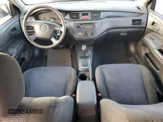 2002 Mitsubishi Lancer LS with VIN JA3AJ36E02U064779, listed as a Copart auction lot 86749184 with 127,343 mi miles and Salvage Title. Bid and sale history available at carsss.com. Image 8.