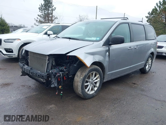 2019 Dodge Grand Caravan SXT with VIN 2C4RDGCG1KR580039, listed as a IAAI auction lot 41997472 with 163,915 mi miles and . Bid and sale history available at DreamBid. Image 18.