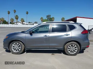2017 Nissan Rogue SV with VIN KNMAT2MT9HP581822, listed as a IAAI auction lot 42140794 with 74,261 mi miles. Bid and sale history available at carsss.com. Image 14.