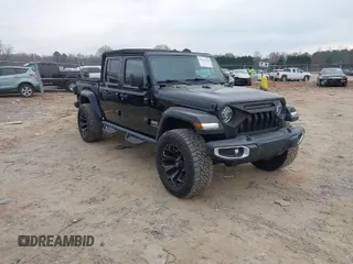 2020 Jeep Gladiator Overland z VIN 1C6HJTFG2LL156105, wystawiony jako IAAI lot #41678120 z przebiegiem 60 058 mil mil oraz . Historia ofert i sprzedaży dostępna na DreamBid. Obrazek 1.