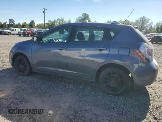 2009 Pontiac Vibe with VIN 5Y2SM67089Z402282, listed as a Copart auction lot 73973264 with 116,743 mi miles and Clean Title. Bid and sale history available at carsss.com. Image 2.