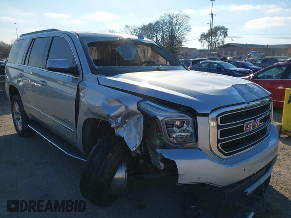 2020 GMC Yukon SLT Standard Edition with VIN 1GKS2DKCXLR294027, listed as a IAAI auction lot 41004965 with 69,161 mi miles. Bid and sale history available at carsss.com. Image 1.