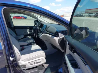 2024 Honda Odyssey Elite z VIN 5FNRL6H97RB057976, wystawiony jako IAAI lot #42428910 z przebiegiem 13 021 mil mil oraz . Historia ofert i sprzedaży dostępna na DreamBid. Obrazek 5.