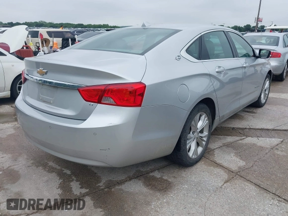 2014 Chevrolet Impala LT with VIN 2G1125S33E9103583, listed as a IAAI auction lot 42125293 with 143,951 mi miles and . Bid and sale history available at DreamBid. Image 4.