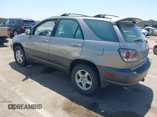2001 Lexus RX 300 z VIN JTJHF10U210197570, wystawiony jako IAAI lot #42371215 z przebiegiem 213 357 mil mil oraz . Historia ofert i sprzedaży dostępna na DreamBid. Obrazek 3.