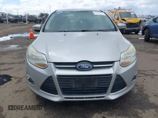 2014 Ford Focus SE with VIN 1FADP3F24EL323728, listed as a IAAI auction lot 41826974 with 141,357 mi miles and . Bid and sale history available at DreamBid. Image 6.