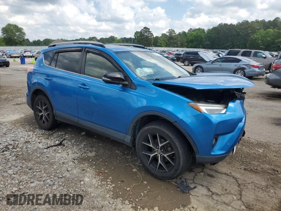 2017 Toyota RAV4 SE with VIN JTMNFREV3HJ713980, listed as a Copart auction lot 54337395 with 176,399 mi miles and Salvage title. Bid and sale history available at DreamBid. Image 4.