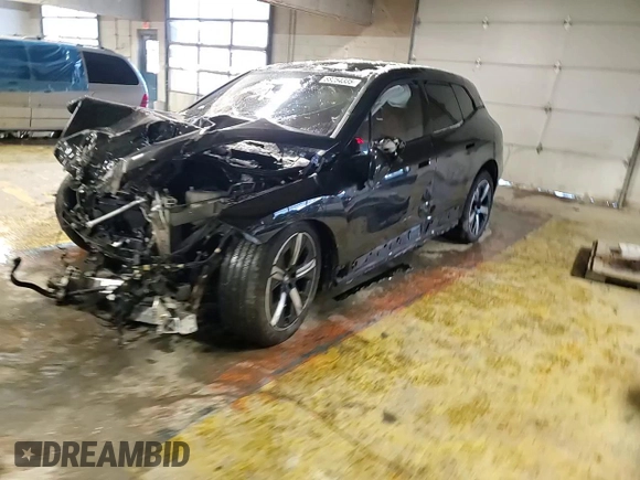 2022 BMW iX xDrive50 with VIN WB523CF05NCJ77119, listed as a Copart auction lot 88254335 with 18,945 mi miles and Salvage Title. Bid and sale history available at carsss.com. Image 12.