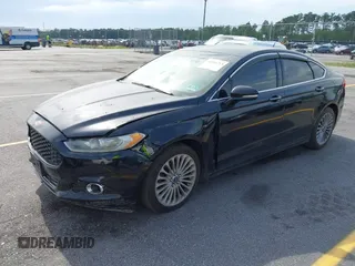 2016 Ford Fusion Titanium with VIN 3FA6P0K90GR179528, listed as a IAAI auction lot 42181213 with 230,264 mi miles. Bid and sale history available at carsss.com. Image 20.