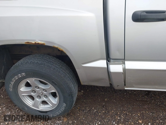 2005 Dodge Dakota SLT with VIN 1D7HE48K25S232893, listed as a IAAI auction lot 41932773 with 209,459 mi miles and . Bid and sale history available at DreamBid. Image 6.
