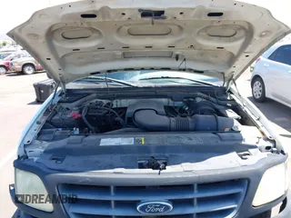 2003 Ford F-150 XL with VIN 2FTRF17W73CA77144, listed as a IAAI auction lot 42609120 with 102,490 mi miles and . Bid and sale history available at DreamBid. Image 10.