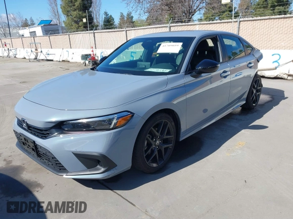 2022 Honda Civic Sport with VIN 2HGFE2F57NH600299, listed as a IAAI auction lot 41709059 with 9,060 mi miles and . Bid and sale history available at carsss.com. Image 19.