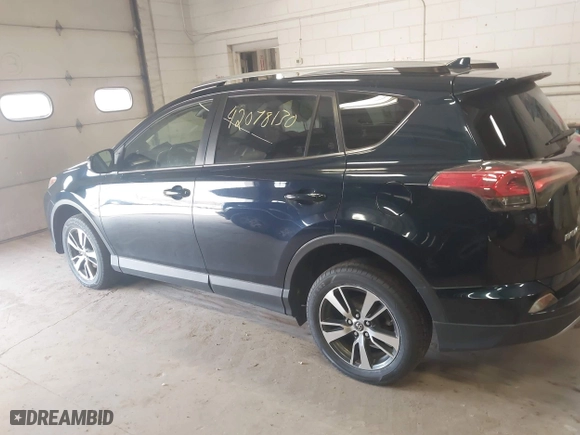 2017 Toyota RAV4 XLE with VIN JTMRFREV6HD208421, listed as a IAAI auction lot 42078130 with 228,365 mi miles. Bid and sale history available at carsss.com. Image 14.