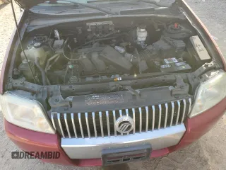 2005 Mercury Mariner Luxury z VIN 4M2YU56175DJ33563, wystawiony jako Copart lot #73497134 z przebiegiem 152 513 mil mil oraz Szkody całkowita. Historia ofert i sprzedaży dostępna na DreamBid. Obrazek 11.