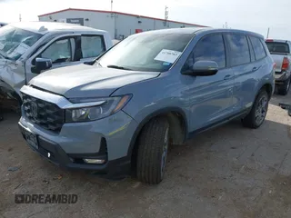2023 Honda Passport EX-L with VIN 5FNYF8H52PB027082, listed as a IAAI auction lot 41788783 with 32,186 mi miles and . Bid and sale history available at carsss.com. Image 17.