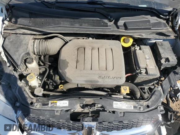 2019 Dodge Grand Caravan SE with VIN 2C4RDGBG5KR796753, listed as a Copart auction lot 49871815 with 97,983 mi miles and Salvage Title. Bid and sale history available at DreamBid. Image 12.