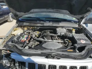 2004 Jeep Grand Cherokee Laredo with VIN 1J4GW48S54C349888, listed as a Copart auction lot 43009574 with 238,247 mi miles and Salvage title. Bid and sale history available at DreamBid. Image 11.