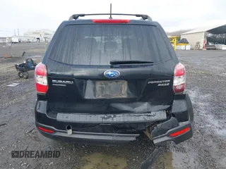2015 Subaru Forester 2.5i Premium with VIN JF2SJADC8FG567560, listed as a IAAI auction lot 41296722 with 75,392 mi miles. Bid and sale history available at carsss.com. Image 16.