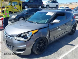 2015 Hyundai Veloster with VIN KMHTC6AD1FU233648, listed as a IAAI auction lot 41822881 with 162,368 mi miles. Bid and sale history available at carsss.com. Image 2.