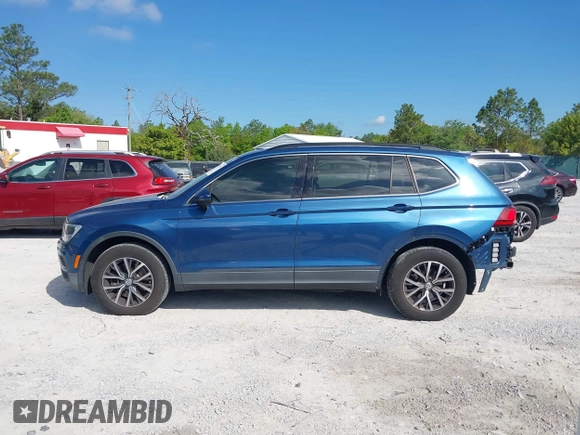 2019 Volkswagen Tiguan SE with VIN 3VV3B7AX2KM006055, listed as a IAAI auction lot 42023713 with 83,570 mi miles and . Bid and sale history available at DreamBid. Image 15.