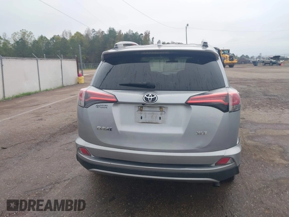 2018 Toyota RAV4 XLE with VIN 2T3WFREV3JW445654, listed as a IAAI auction lot 40849666 with 69,365 mi miles and . Bid and sale history available at DreamBid. Image 16.