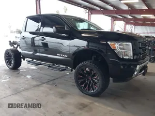 2024 Nissan Titan SV with VIN 1N6AA1EF5RN104565, listed as a IAAI auction lot 41173176 with 30,784 mi miles and . Bid and sale history available at DreamBid. Image 1.