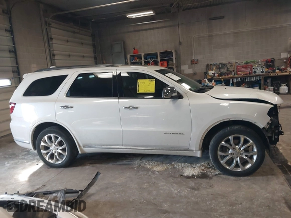 2017 Dodge Durango Citadel with VIN 1C4RDJEGXHC652853, listed as a IAAI auction lot 41631921 with 110,427 mi miles and . Bid and sale history available at carsss.com. Image 14.