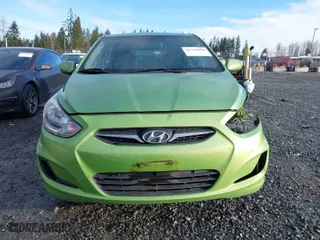 2012 Hyundai Accent GS with VIN KMHCT5AE9CU021238, listed as a IAAI auction lot 41762650 with 166,287 mi miles. Bid and sale history available at carsss.com. Image 13.