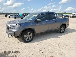 2023 Honda Ridgeline RTL z VIN 5FPYK3F54PB043289, wystawiony jako Copart lot #59173065 z przebiegiem 34 219 mil mil oraz Szkoda całkowita • Salvage title. Historia ofert i sprzedaży dostępna na DreamBid. Obrazek 1.