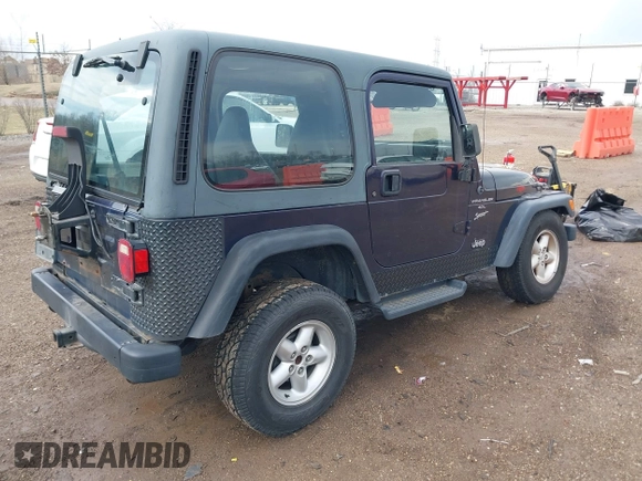1999 Jeep Wrangler Sport with VIN 1J4FY19S9XP419330, listed as a IAAI auction lot 41913314 with 167,176 mi miles. Bid and sale history available at carsss.com. Image 4.