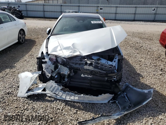 2025 Toyota Camry LE with VIN 4T1DAACKXSU052793, listed as a Copart auction lot 50166545 with 8,577 mi miles and Salvage Title. Bid and sale history available at DreamBid. Image 5.