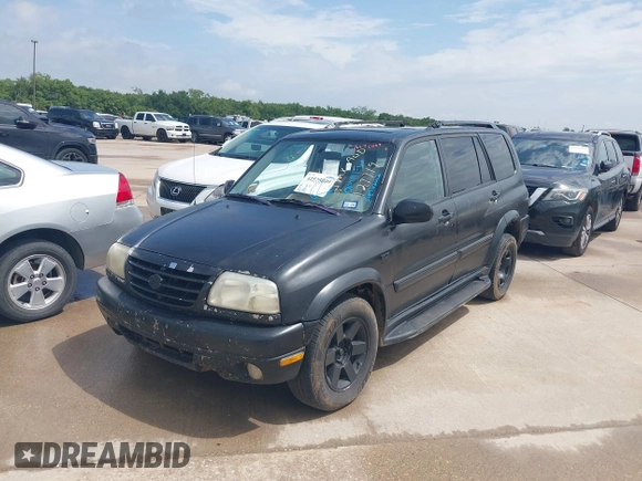 2002 Suzuki XL7 Standard z VIN JS3TX92V924127719, wystawiony jako IAAI lot #42575009 z przebiegiem 298 096 mil mil oraz . Historia ofert i sprzedaży dostępna na DreamBid. Obrazek 2.