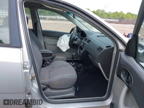 2005 Ford Focus S with VIN 3FAFP37N05R132259, listed as a IAAI auction lot 42474574 with 276,742 mi miles and . Bid and sale history available at DreamBid. Image 5.