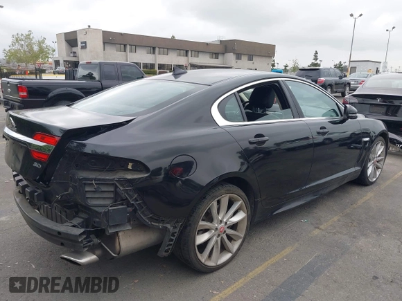 2015 Jaguar XF V6 Portfolio with VIN SAJWA0F77F8U65737, listed as a IAAI auction lot 42078529 with 62,229 mi miles. Bid and sale history available at carsss.com. Image 4.