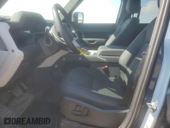 2025 Land Rover Defender S with VIN SALEJ7EXXS2358756, listed as a Copart auction lot 58084165 with 10,919 mi miles and Salvage title. Bid and sale history available at DreamBid. Image 7.