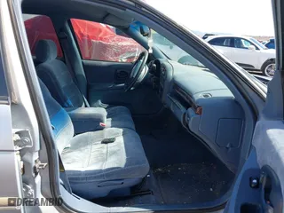 1997 Chevrolet Lumina with VIN 2G1WL52M5V9216883, listed as a IAAI auction lot 41797511 with 231,779 mi miles. Bid and sale history available at carsss.com. Image 5.