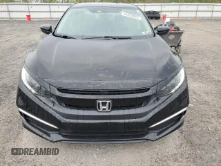 2021 Honda Civic LX z VIN 2HGFC2F6XMH502056, wystawiony jako Copart lot #54393025 z przebiegiem 57 080 mil mil oraz Czysty tytuł • Clean title. Historia ofert i sprzedaży dostępna na DreamBid. Obrazek 5.