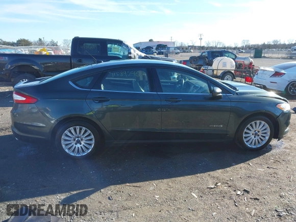 2015 Ford Fusion S Hybrid with VIN 3FA6P0UU7FR117785, listed as a IAAI auction lot 41589546 with 136,657 mi miles. Bid and sale history available at carsss.com. Image 13.