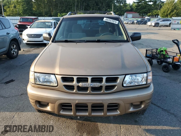 2001 Isuzu Rodeo S with VIN 4S2CK58W314334096, listed as a Copart auction lot 68262924 with 140,657 mi miles and Salvage Title. Bid and sale history available at DreamBid. Image 5.