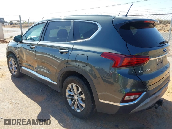 2019 Hyundai Santa Fe SE with VIN 5NMS23AD2KH134016, listed as a IAAI auction lot 41977240 with 61,448 mi miles and . Bid and sale history available at DreamBid. Image 3.